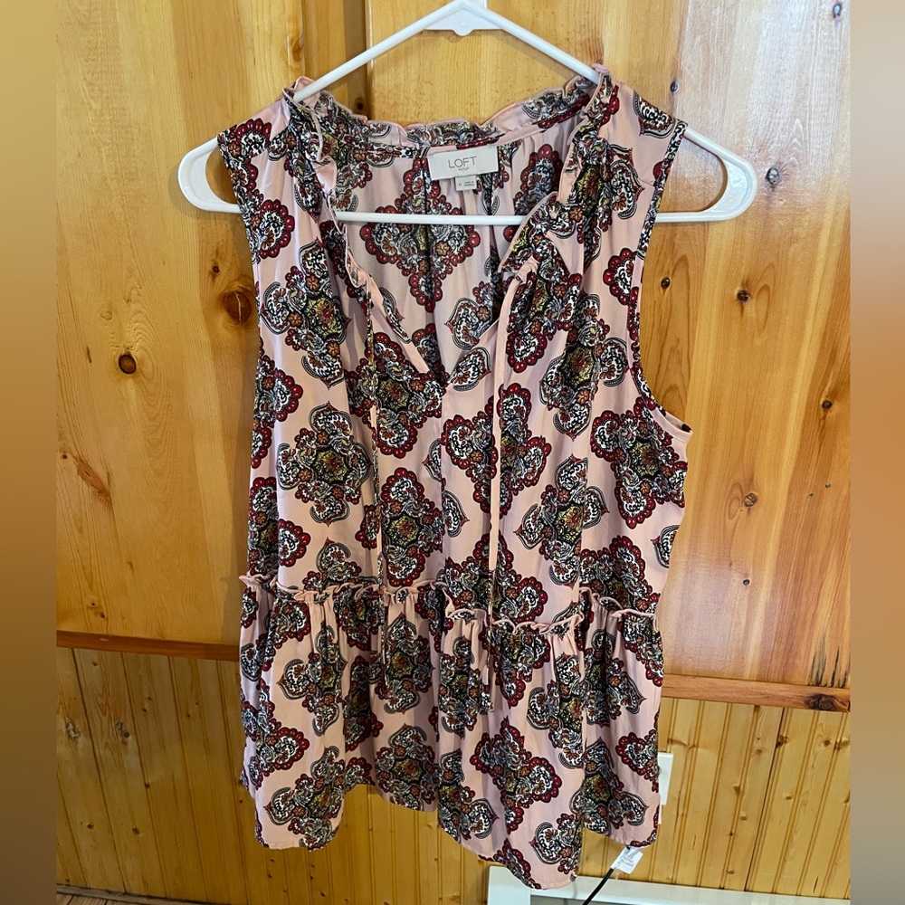 Loft peplum tank top size medium.